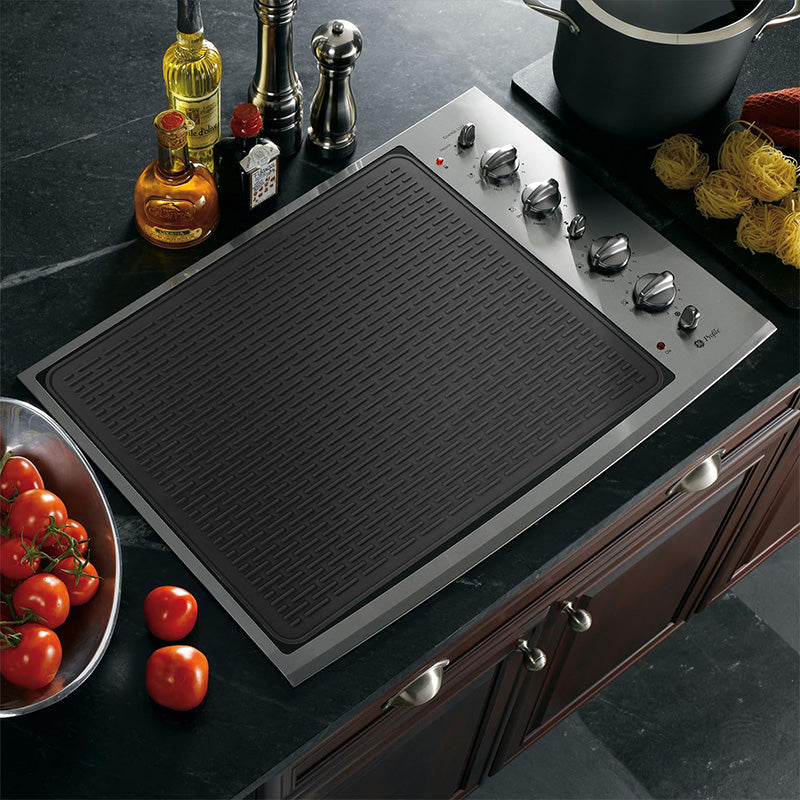 Multi-purpose silicone mat for electric hobs